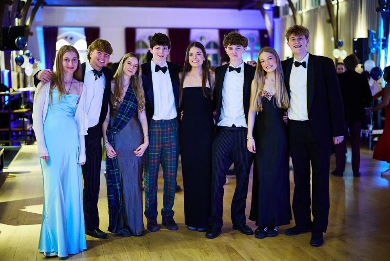 Girls and boys enjoying the ball.