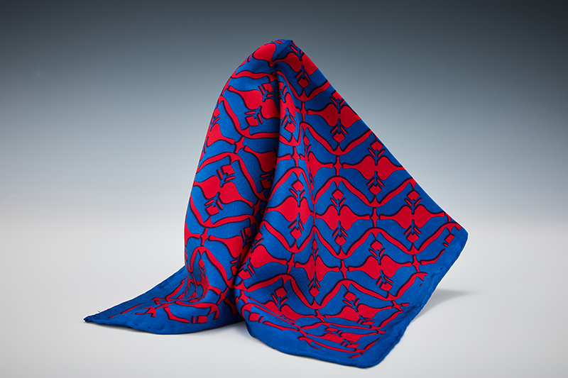 Blue and red patterned silk handkerchief.
