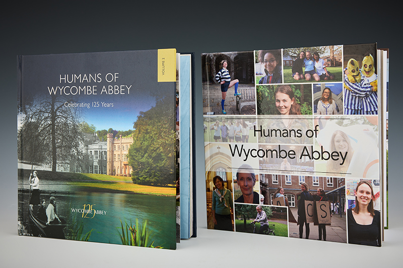 Hardback copies of Humans of Wycombe Abbey Series 1 & 2: Series 1 features the Abbey fading from B&W to colour; Series 2 showcases a people collage.