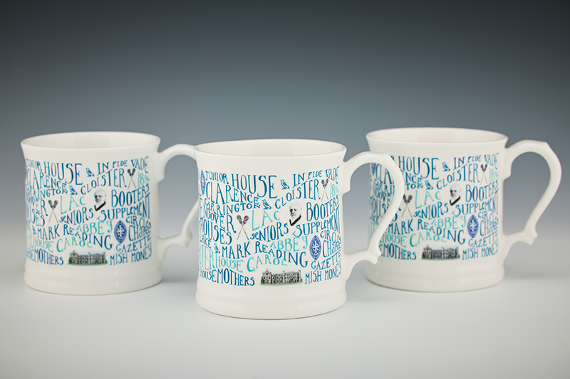 Three mugs branded with a Wycombe Abbey wordcloud.