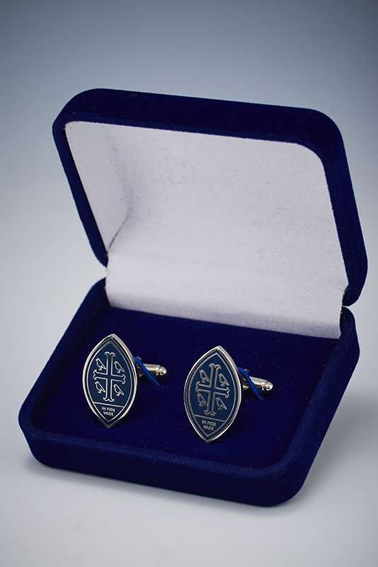 Blue Wycombe Abbey cufflinks with the logo.